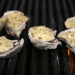 Chargrilled Oysters topped with Artichoke Cream Chargrilled Oysters topped with Artichoke Cream