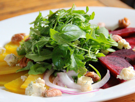 Late Summer Beet, Arugula, Basil & Creamy Blue Cheese Salad topped with Salted Pecans & Orange Vinaigrette